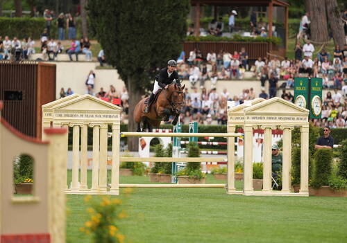1m55; Steve Guerdat & Caracho. Photo(c) Rolex/Sportfot